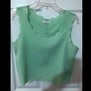Mint green crop top. Scalloped edges.